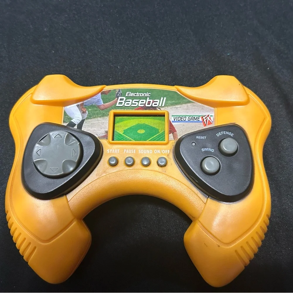 Hand held baseball game! Cover to battery department missing need new batteries
